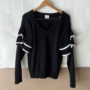 Women’s ruffled long sleeve sweater black and white size large sienna sky